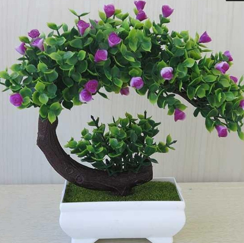 Plastic bonsai with fake flowers