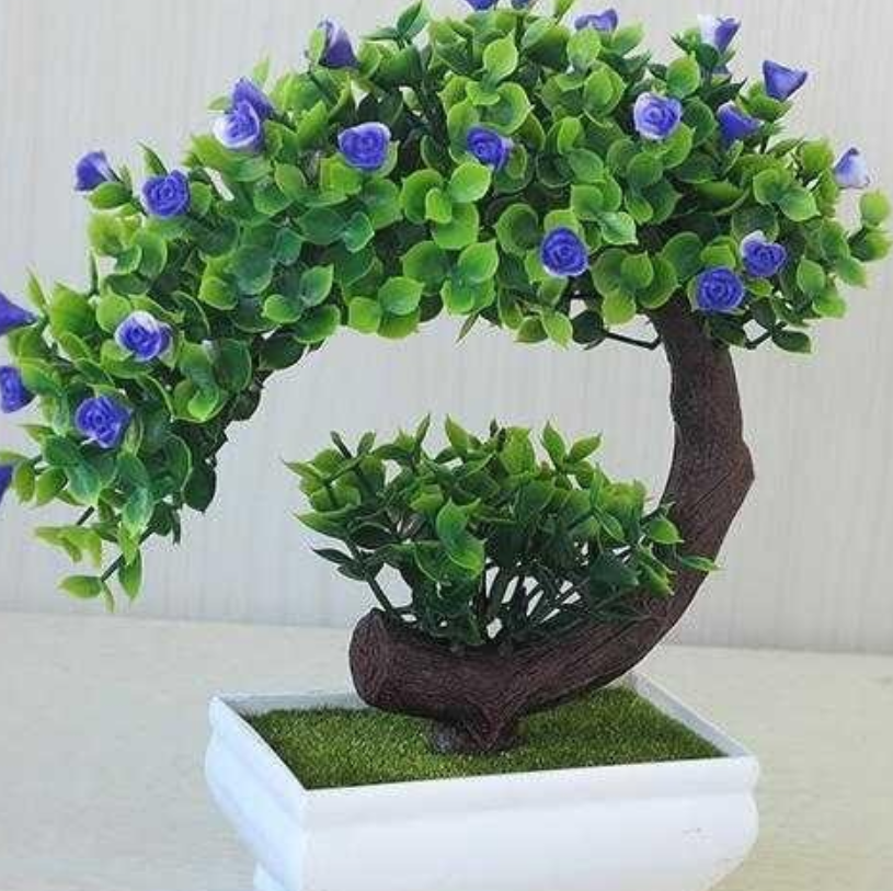 Plastic bonsai with fake flowers